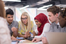 Team of people working together at a table